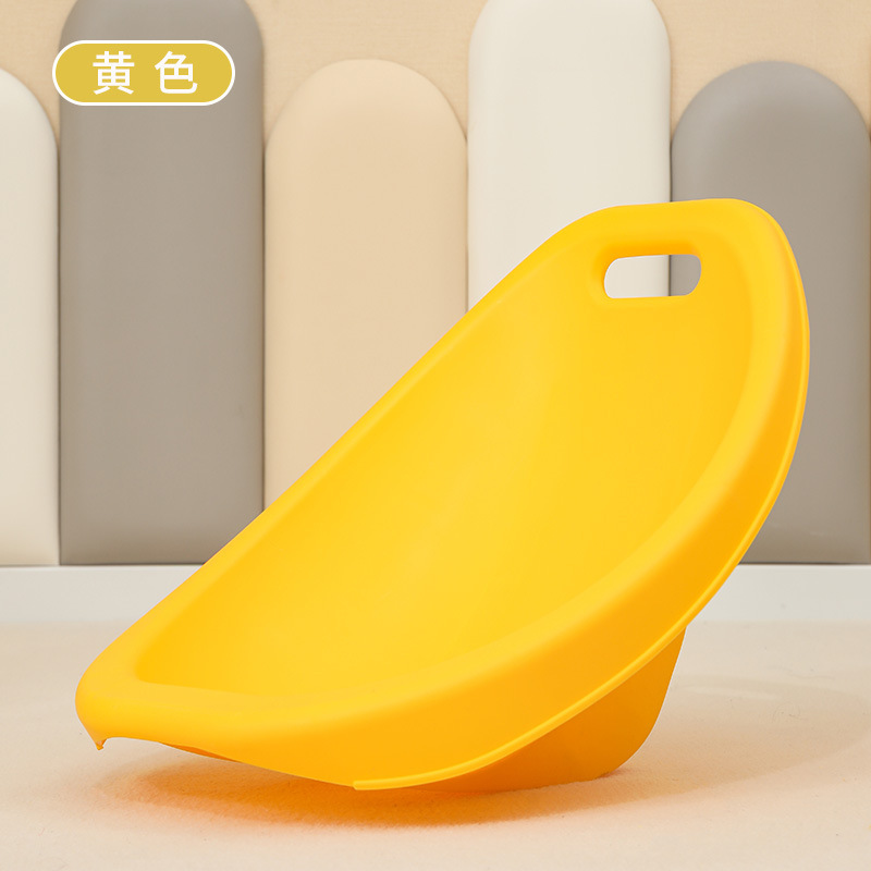 A yellow sensory integration chair