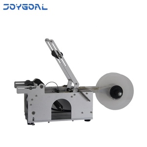 Etichettatrici manuali semi automatiche orizzontali piccole per lattine di vasetti di bottiglie di birra per alimenti rotondi con funzione di codifica - Product Image 2
