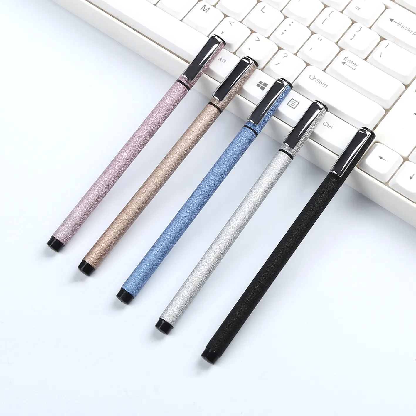 TTX Personalized Advertising Cheap Metal Business Ball Pen Twist Roller Tip Pen With Slogan