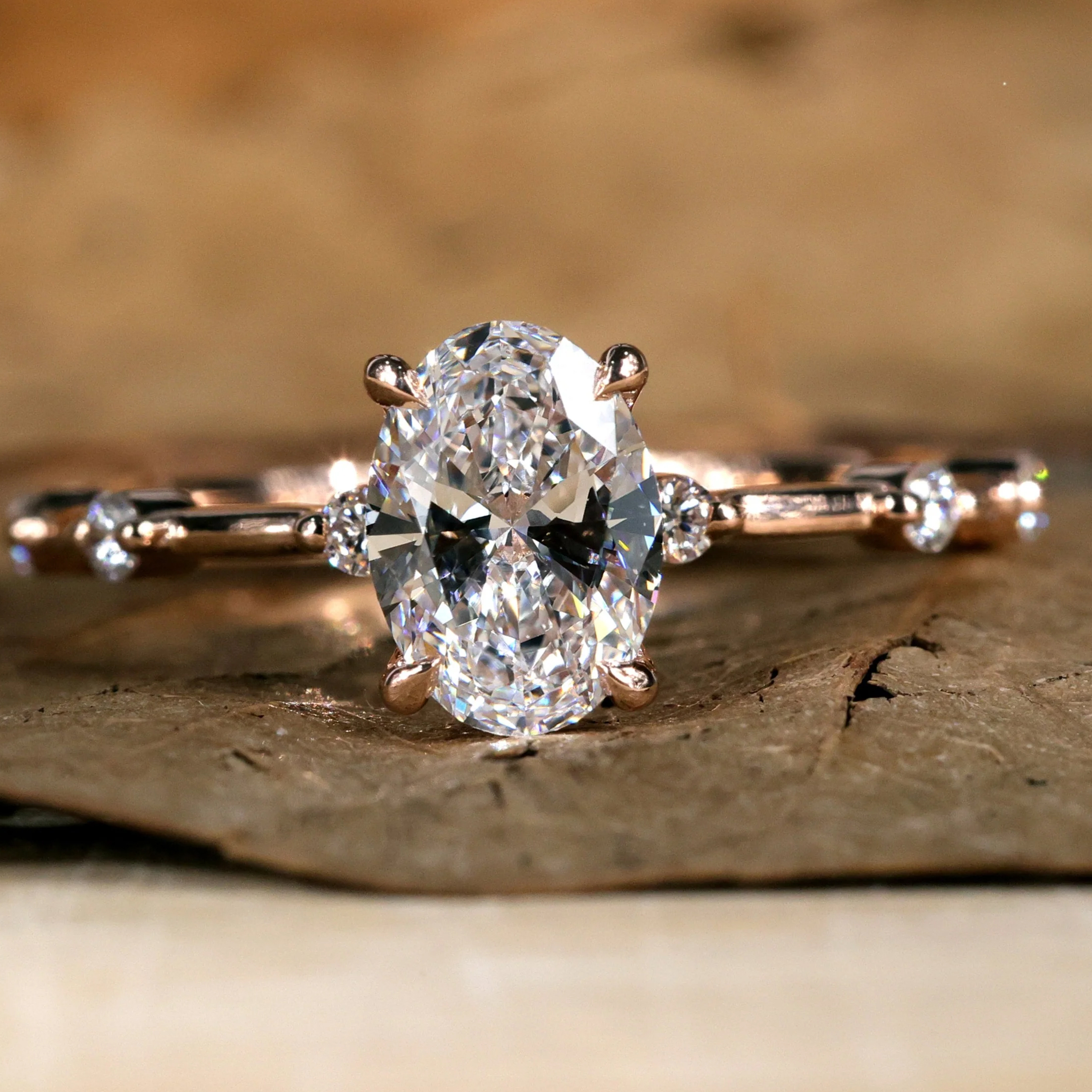 oval side-stone ring