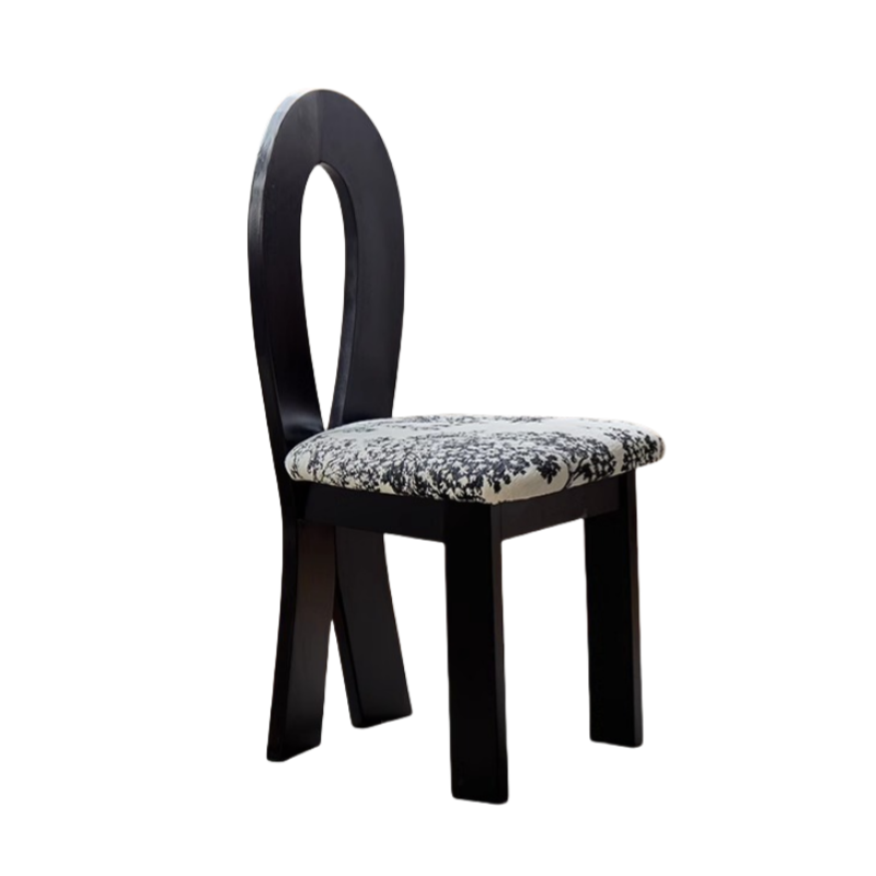 Silla sirena de terciopelo floral con estructura negra