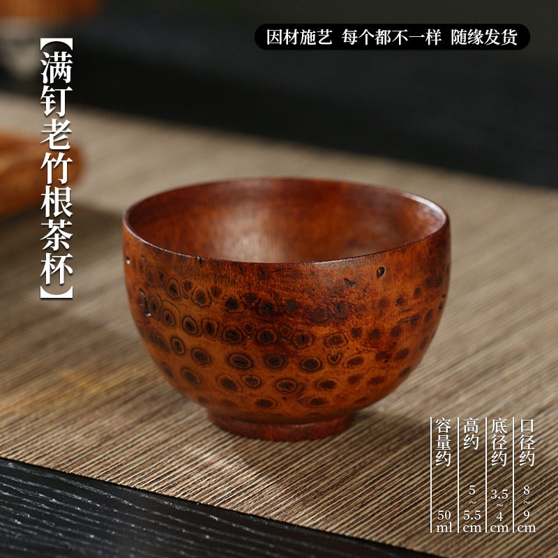 Lacquered teacup with nails on old bamboo roots