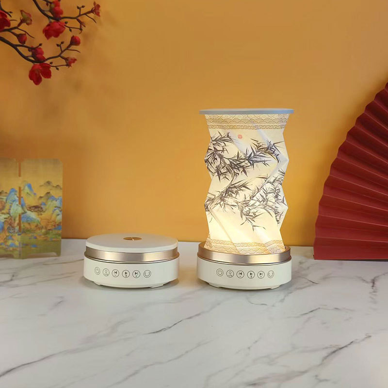 White-ink bamboo figure-rotating bluetooth