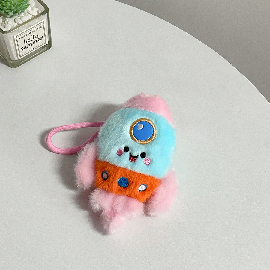 Pink-blue-orange patchwork rocket pendant