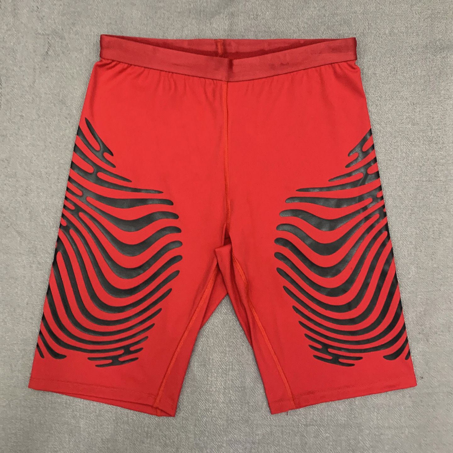 Pantaloni cropped ondulati rossi