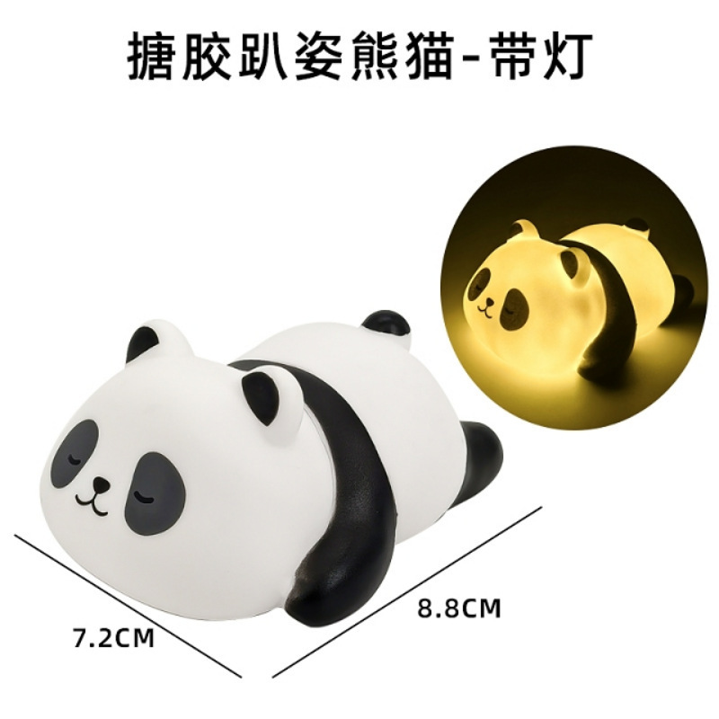 One vinyl panda in a sitting/lying position (with light)