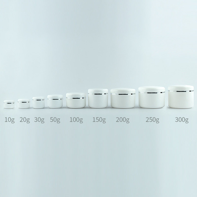 white jar with silver rim lid