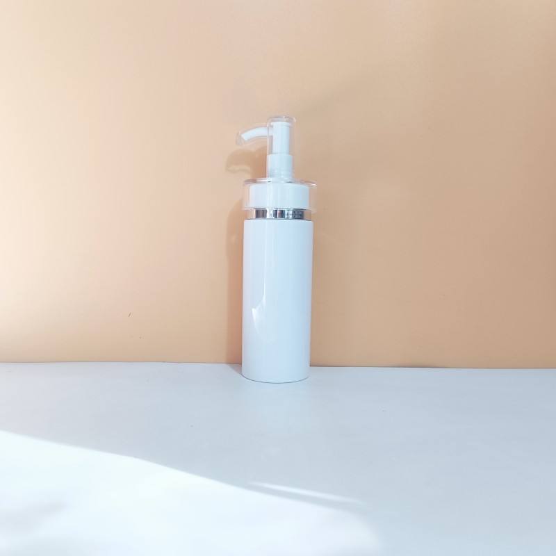 White bottle with silver rim pump