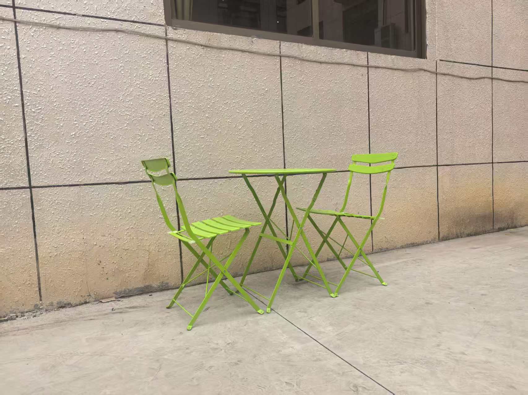 Green grass-one table and two chairs