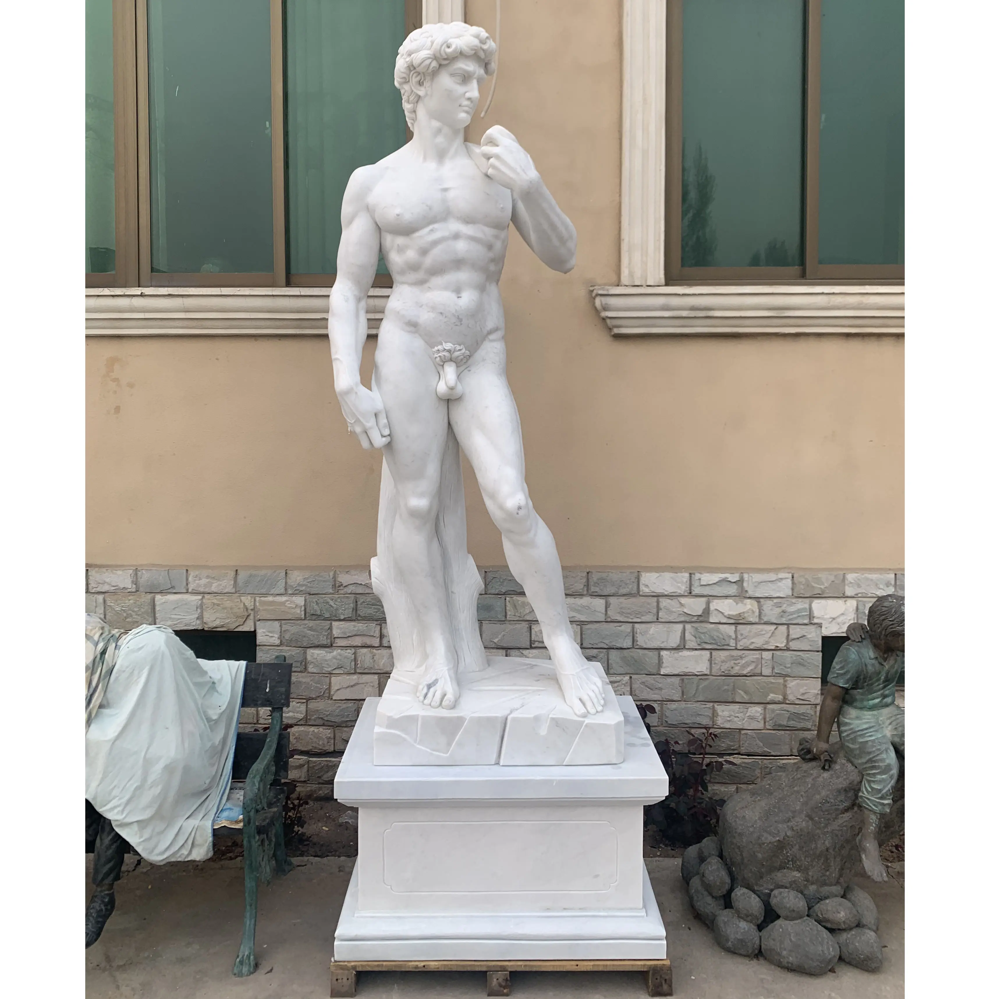 Statua di scultura di David in marmo a grandezza naturale intagliato a mano da giardino all'aperto