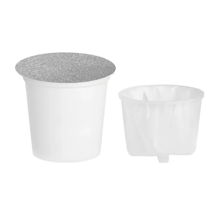 O copo biodegradável de café da xícara e do filtro vazio descartável