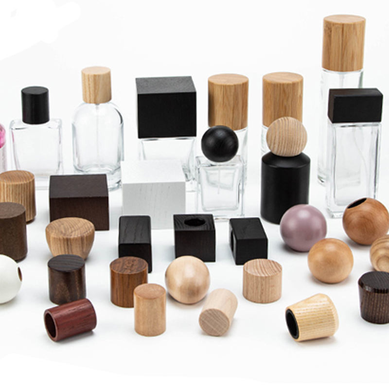 Casquillo de madera del perfume