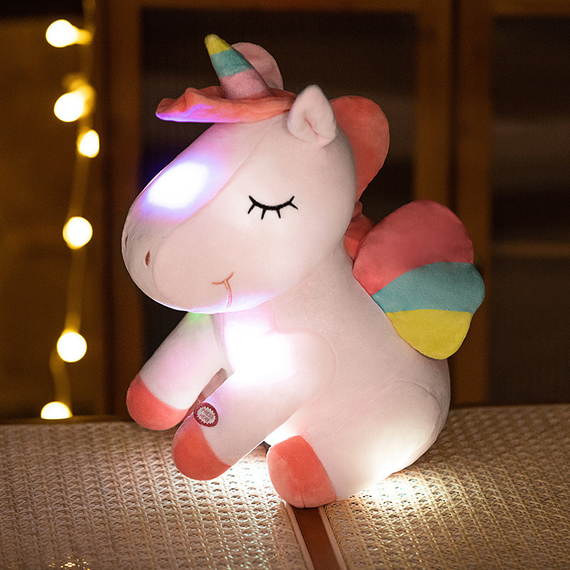 Unicornio blanco sentado
