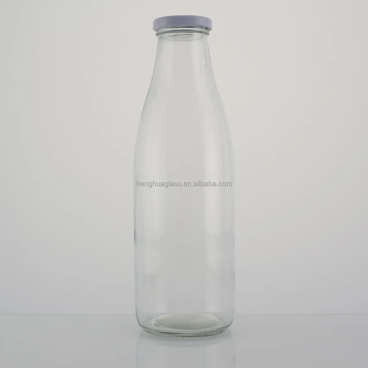 Bouteille de lait ronde en verre de 1 litre 1 litre personnalisée 32oz 1000ml contenant scellé de jus de lait bouteille en verre avec couvercle à cosse en métal blanc vente en gros