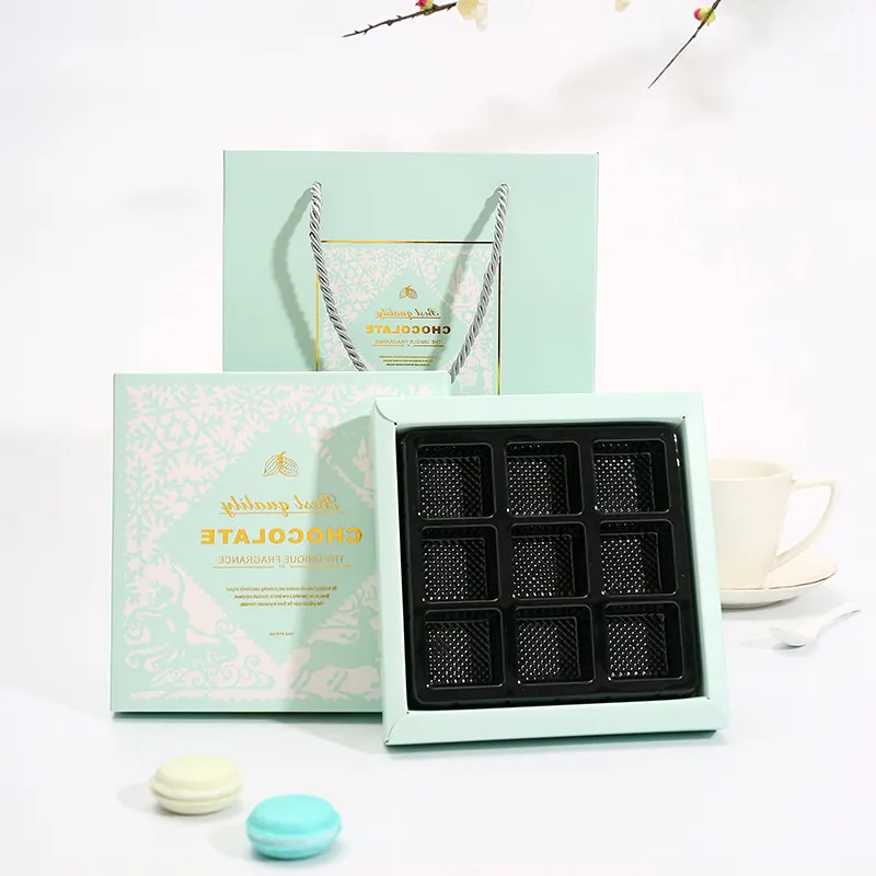 Caja de cartón de menta hecha a medida con tapa decorativa de lazo y logotipo personalizado para chocolate con separadores