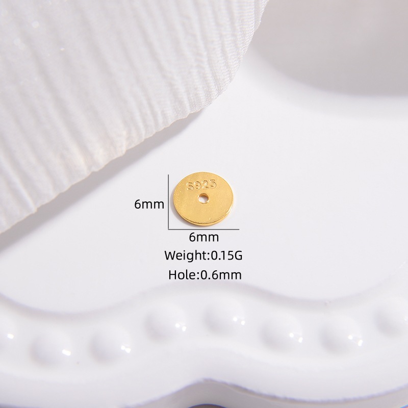 Un or 6mm (1g environ 7 pièces)