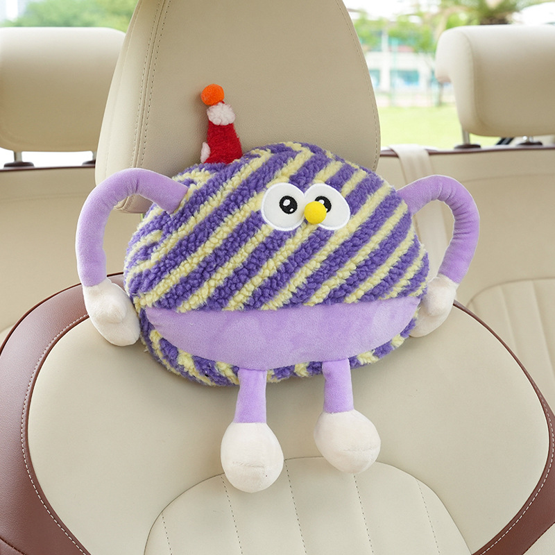 Appui-tête monstre en peluche à rayures violettes