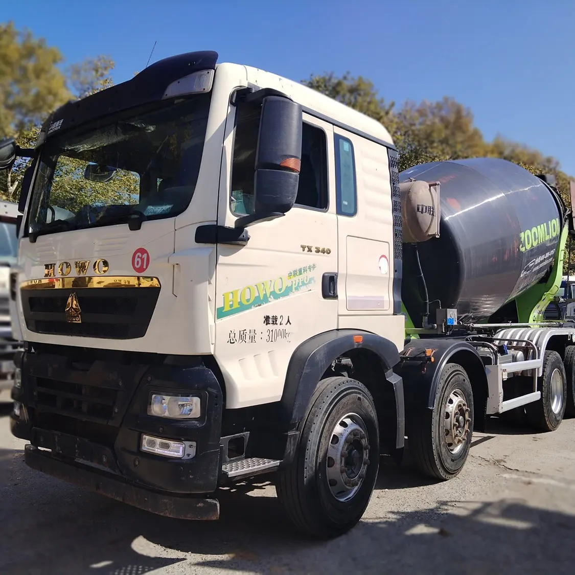 Camion bétonnière Zoomlion 10m3 d'occasion Mélangeur de béton HOWO Châssis Prix