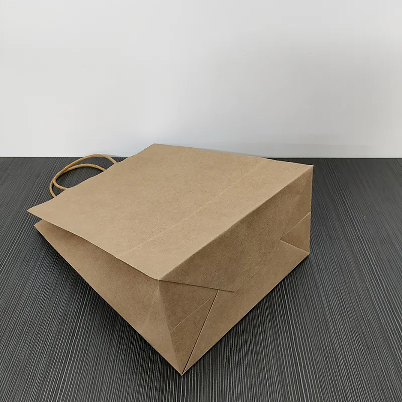 Sacs en papier kraft brun personnalisés avec votre propre logo pour l'emballage d'épicerie/entreprise/shopping/fête/vente au détail/plats à emporter/anniversaire