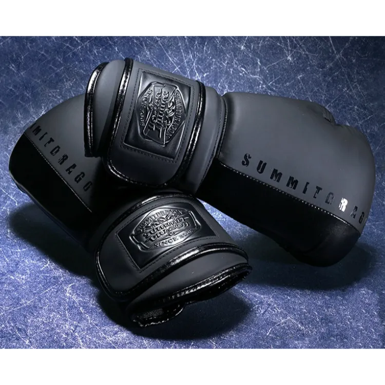 Venta al por mayor de cuero profesional de entrenamiento logotipo personalizado grabado 3D logotipo negro mate guantes de boxeo