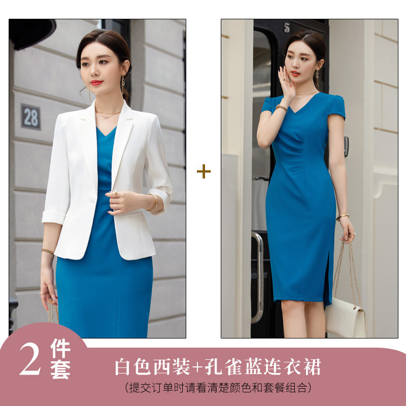 White suit and peacock blue dress