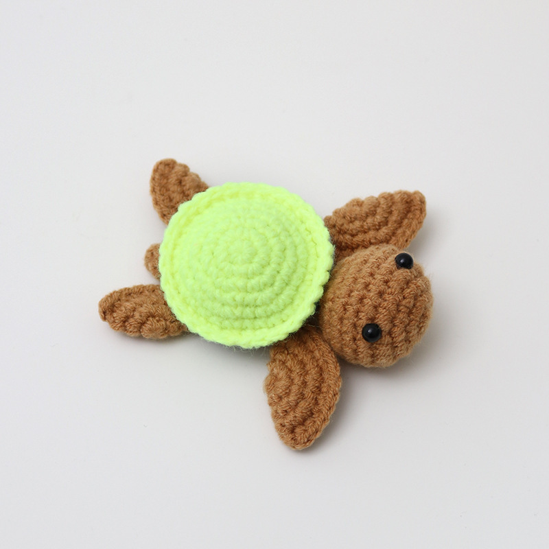 Tartaruga verde fluorescente-marrone scuro