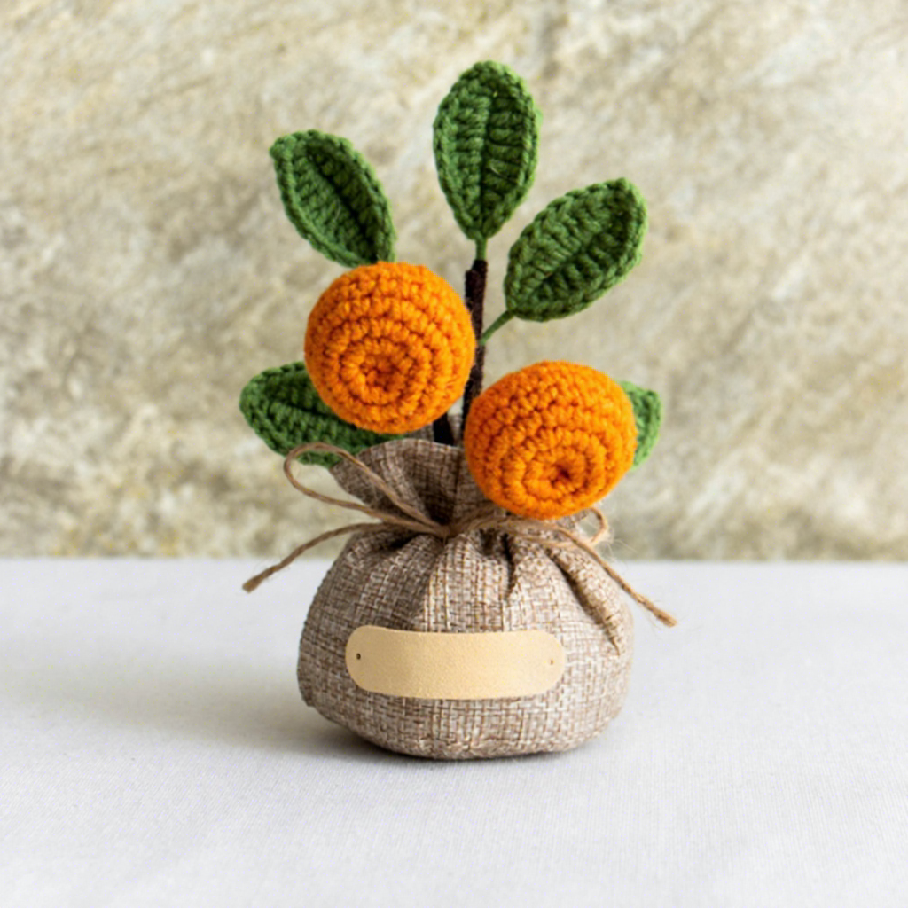Sac porte-bonheur en pot orange