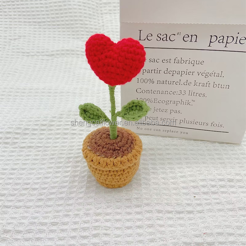 2 petites fleurs de port tricotées au crochet 12*5*5cm