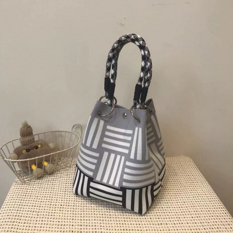 Black and gray horizontal vertical handbag