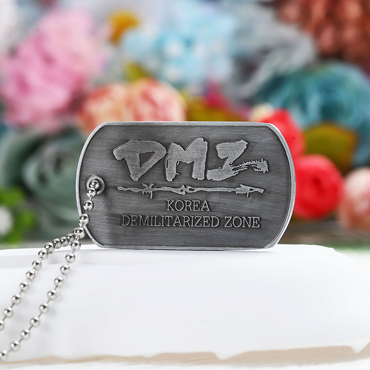 antique silver plated dog tag