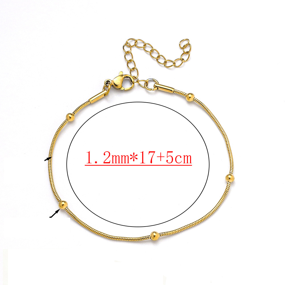 B2510099 Perline con clip a forma di serpente - oro - larghezza 1,2 mm