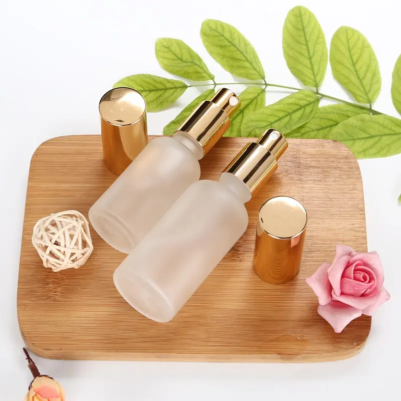 Botella pulverizadora de vidrio con tapa dorada y plateada negra, 100ml, para embalaje de cosméticos para cuidado de la piel