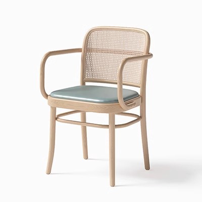 Chaise en rotin et fer avec accoudoirs