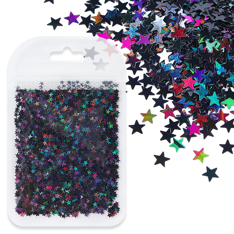 Estrella pequeña de 2g en bolsa transparente color hueso - negro - 6