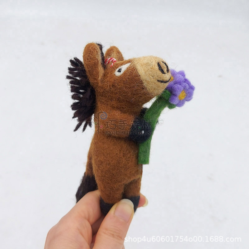 Horse holding purple flower ball