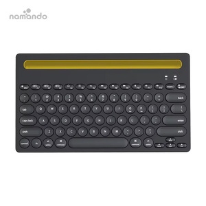 Compact 2.4G and BT Dual Modes Wireless <strong>Keyboard</strong> With Phone/Table Holder &amp; Volume Knob for Multi-devices - Product Image 1