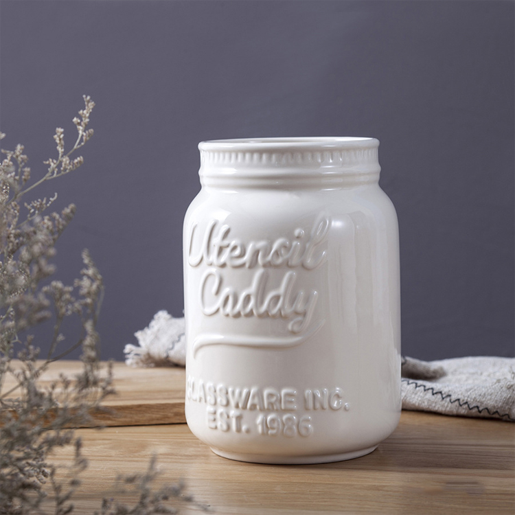 Ceramic sealed jar pure white creative embossed tea ceramic jar custom LOGO ceramic storage storage jar