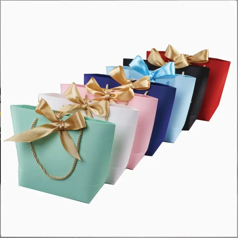 Bolsas de lujo con logotipo impreso, papel de compras dorado, embalaje de regalo con su propio logotipo