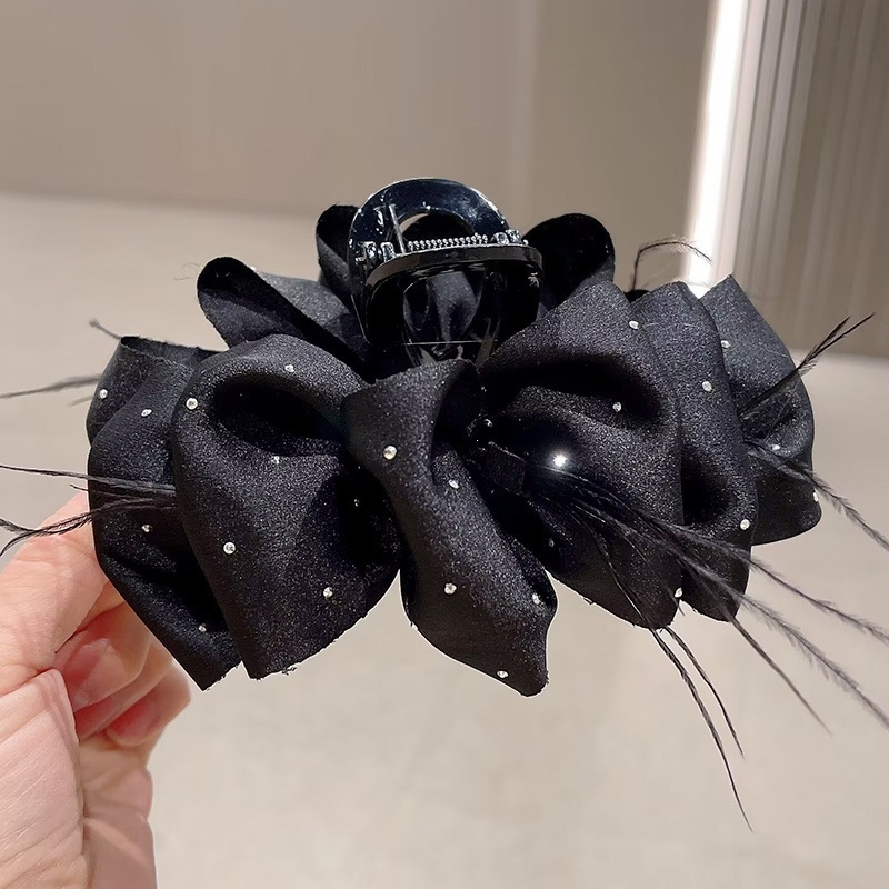 7 black feather satin polka-dot cloud clip