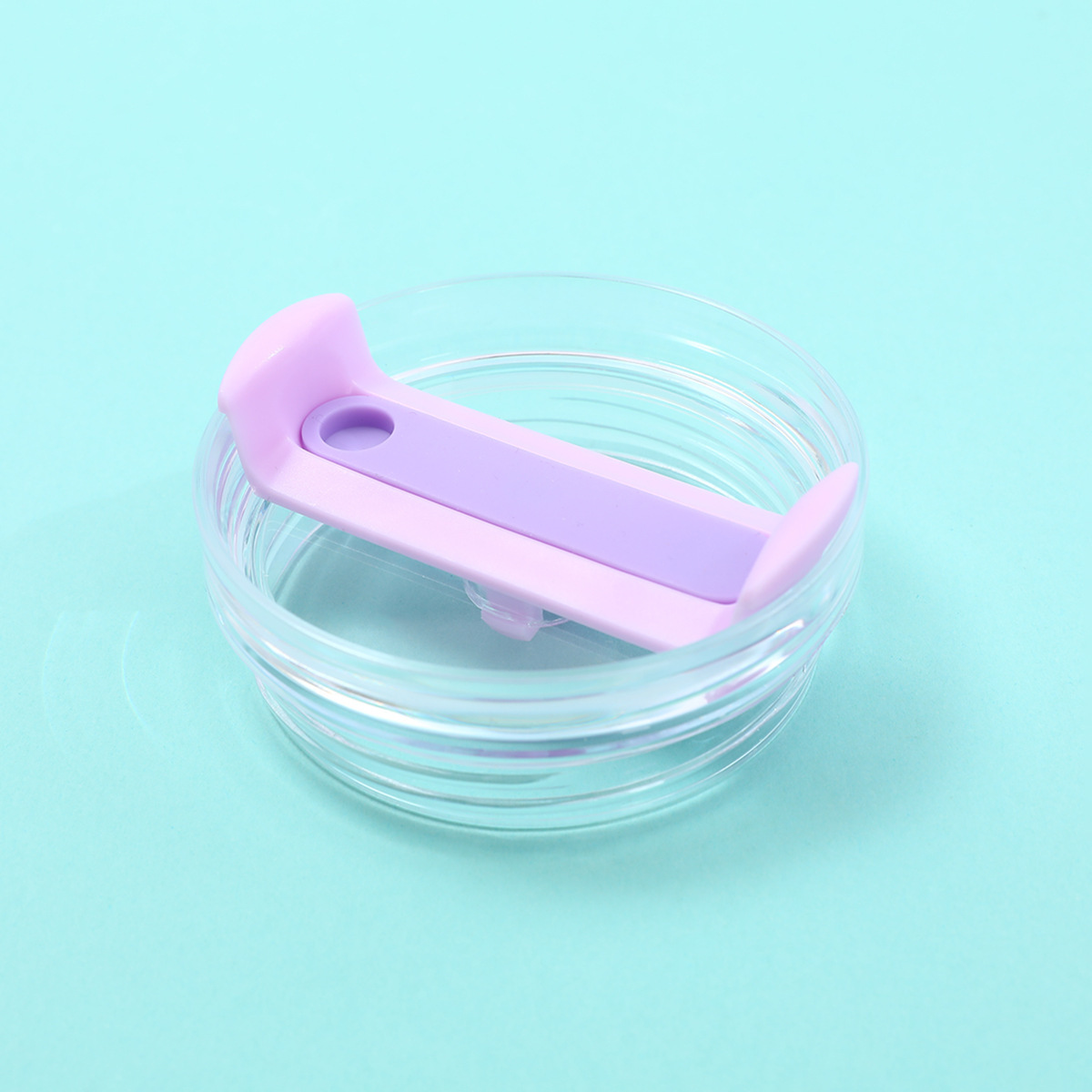 Pièce transparente violet clair de 9 cm.