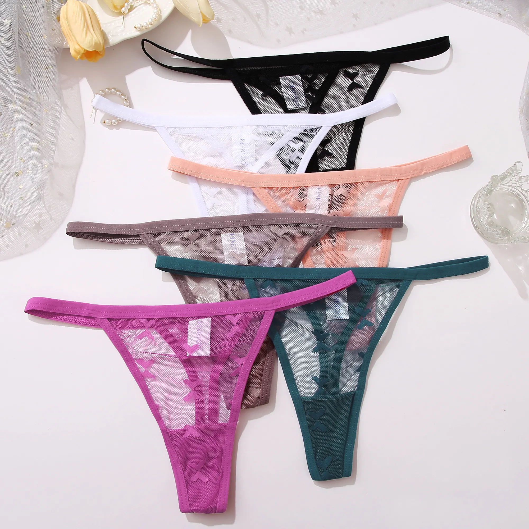 Vente en gros d'usine FINETOO Nouveau design de ceinture en dentelle avec lettres pour femmes Culotte super sexy tongs confortables pour dames T-back pour filles