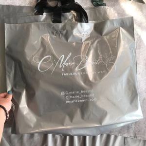 Biodegradable Poly Plastic <strong>Soft</strong> <strong>Loop</strong> <strong>Handle</strong> Shopping Packaging Bag with Custom Print logo - Product Image 2