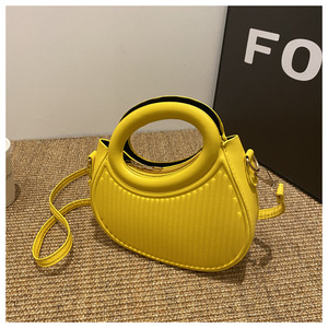 Taze tatlı saf renk çizgili çanta kadın omuz crossbody çanta yeni 2024 popüler pu yuvarlak çanta