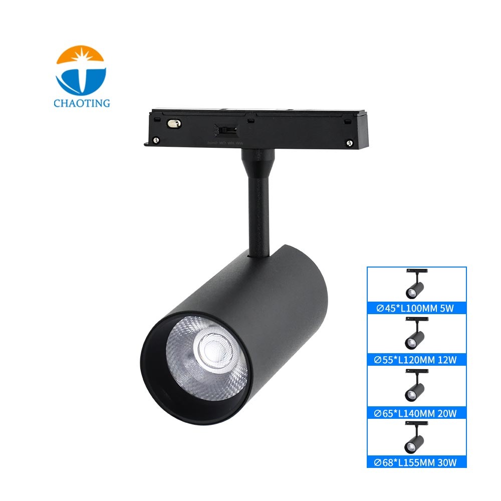 Projecteur sur rail noir et blanc