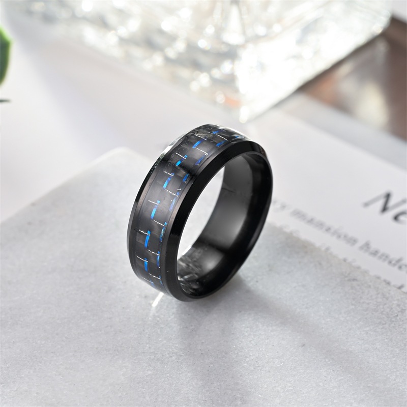 Anillo de fibra de carbono dorado con puntos negros 8X