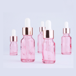 Botella de aceite esencial de vidrio transparente 5ml 10ml 15ml 20ml 30ml 50ml 100mL Esencia cuentagotas Botella cosmética de vidrio Rosa vacía - Product Image 1