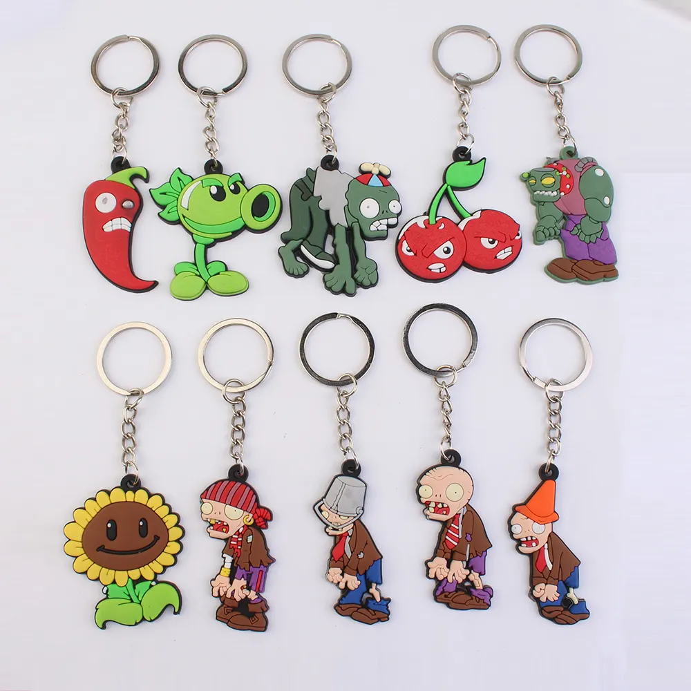 2023 venta al por mayor 2D PVC personalizado creativo nueva llegada clásico divertido juego personaje planta Zombie llaveros anillo fiesta regalos para chico