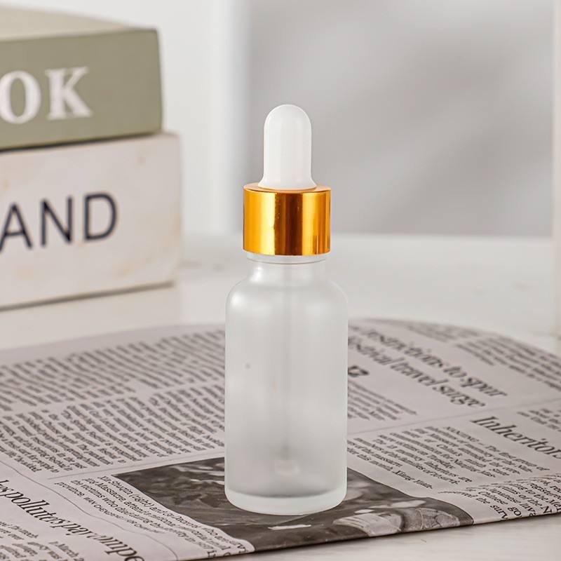 ขวดหยดแก้วฝ้า + แหวนทอง + ยางสีขาว