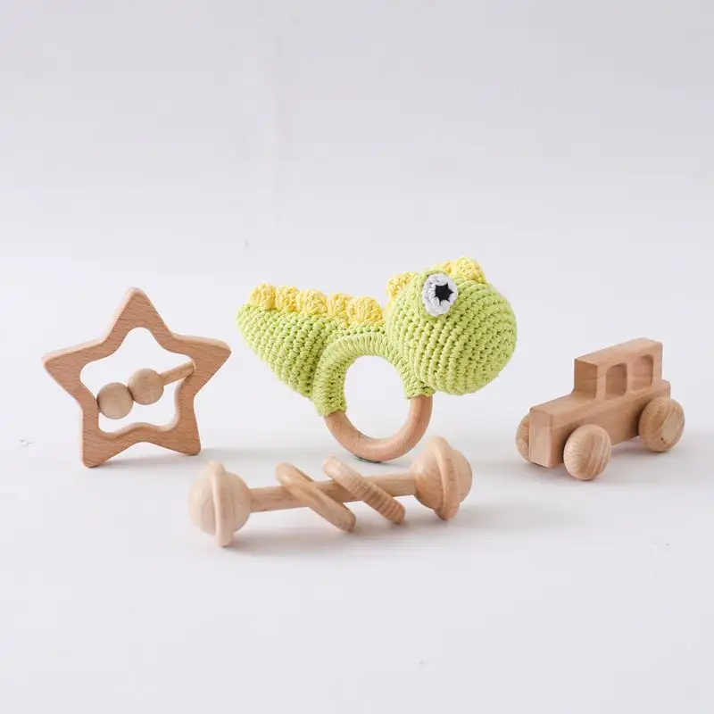 Set regalo dinosauro bambino Crochet animale sonaglio cinque quattro pezzi Set massaggiagengive giocattolo all'ingrosso