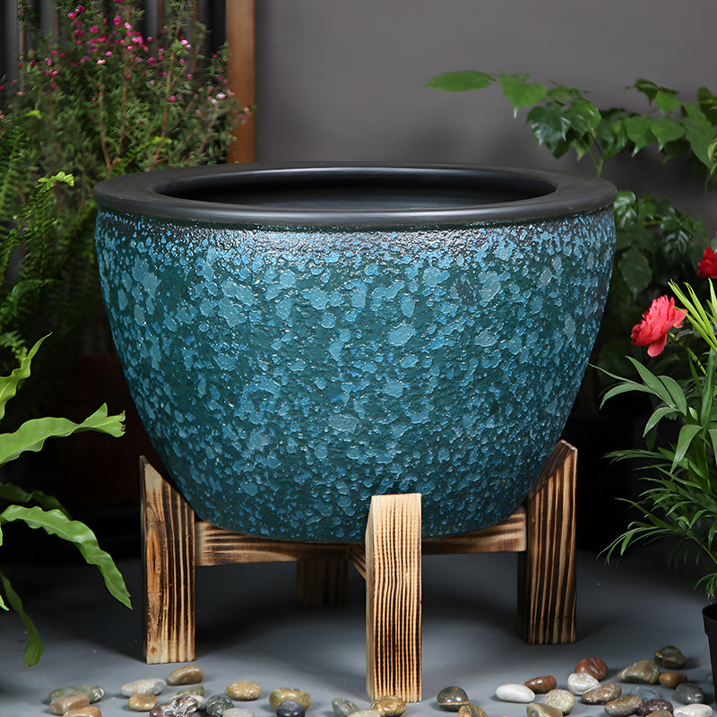 Glassa a bolle verde con base in legno massello
